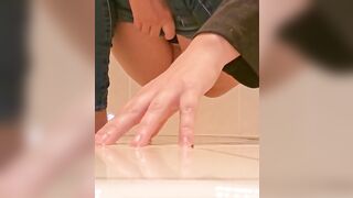 Messy Piss Puddle all over the Bathroom Floor